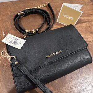 NWT- MICHAEL KORS Saffiano Leather 3-in-1
Crossbody. Jet Set Travel bag